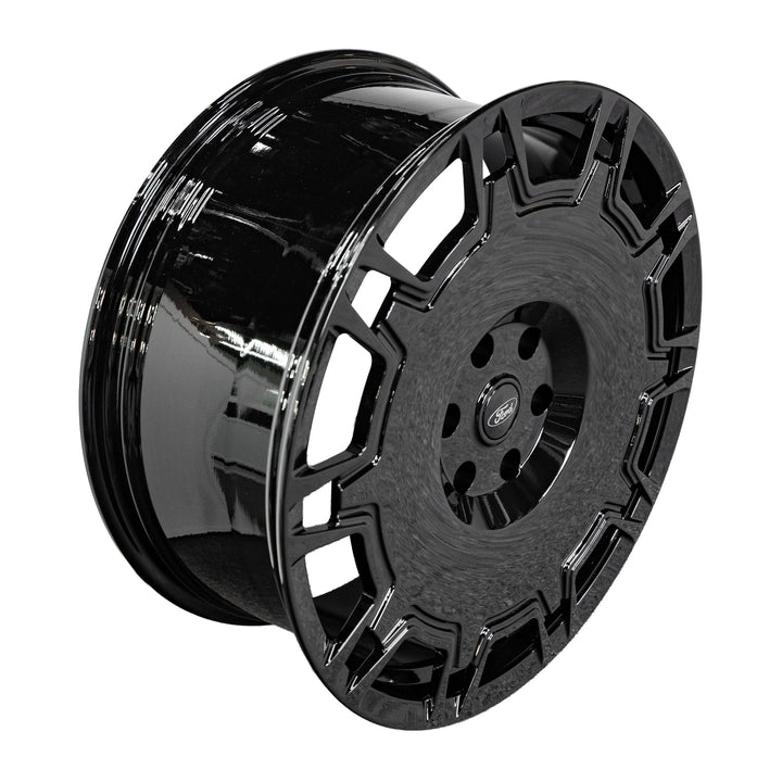 A glossy black multi-spoke alloy wheel rim shown at a three-quarter angle on a plain white background.