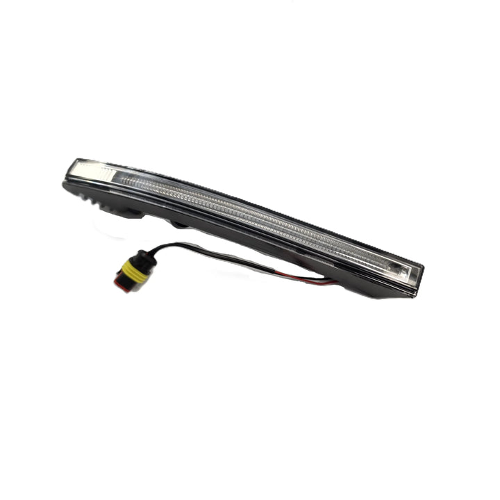 A long, rectangular automotive light bar with a clear lens and integrated LED strip, shown on a plain white background. It has a black housing, a small yellow-and-black connector, and attached wires.