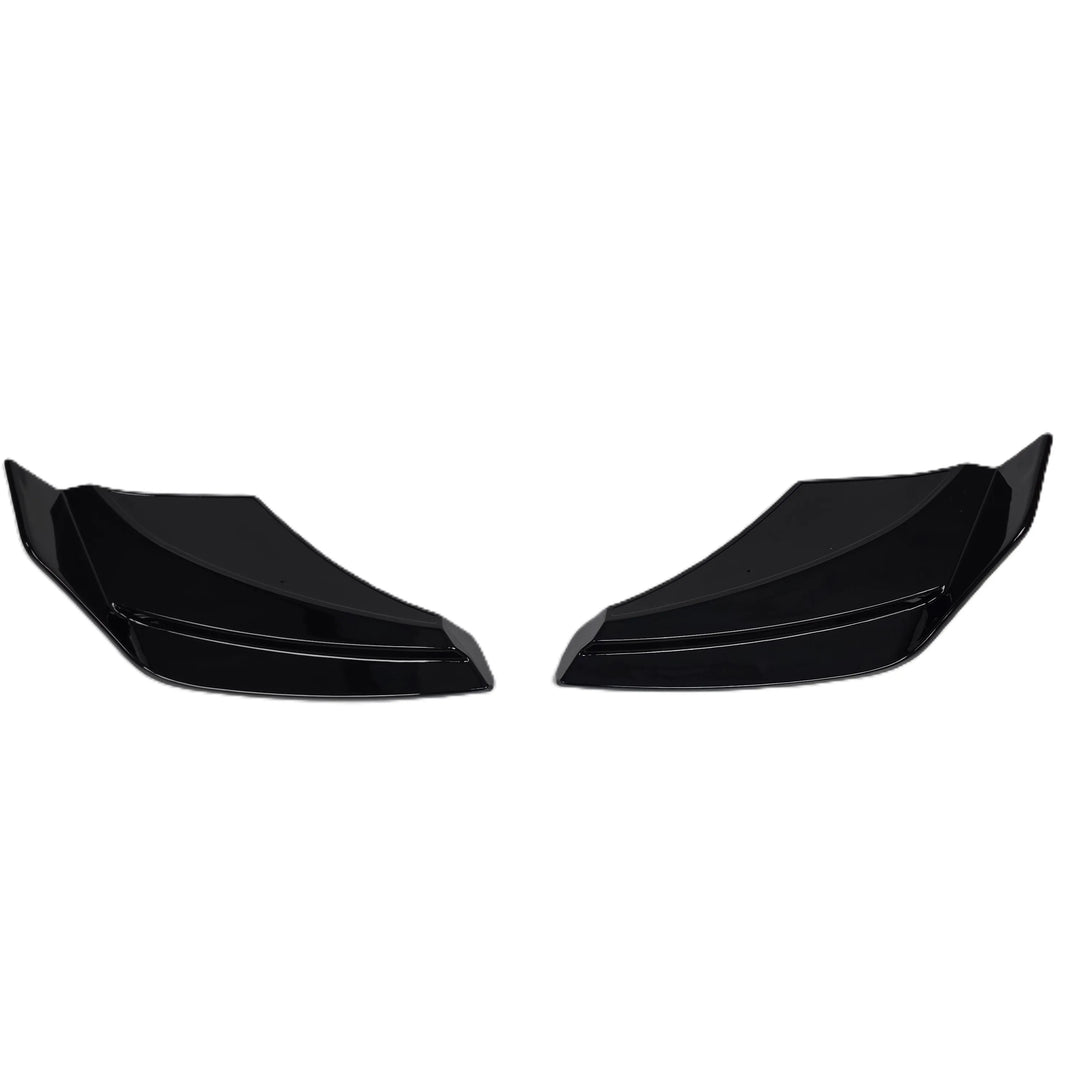 A pair of glossy black plastic car body trim pieces, Rear Bumper splitter or Trim extensions, shown against a plain white background.

