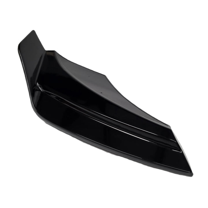 LHS black plastic ABS Rear Bumper Canard Land Rover L663 vehicle lower lip with glossy finish shown against a solid white background.