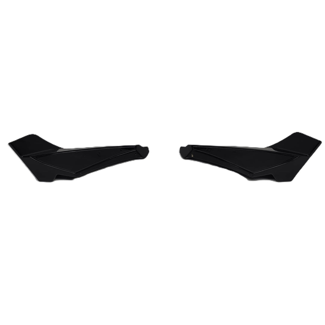 reverse shot of a pair of black plastic ABS Rear Bumper Canards designed for Land Rover L663 vehicle lower lip with glossy finish shown against a solid white background.