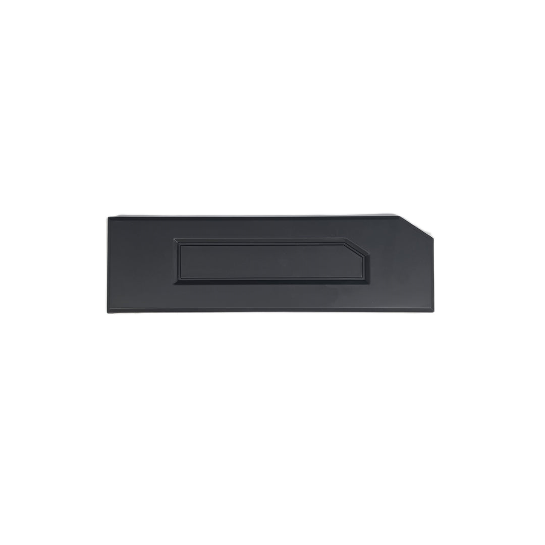 A black 'D' lettering a recessed center panel and beveled edges is a missing D letter for a ford ranger tailgate cover , shown on a plain white background.
