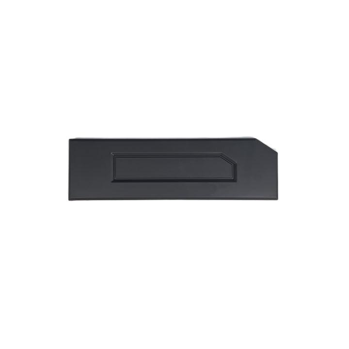 A black 'D' lettering a recessed center panel and beveled edges is a missing D letter for a ford ranger tailgate cover , shown on a plain white background.
