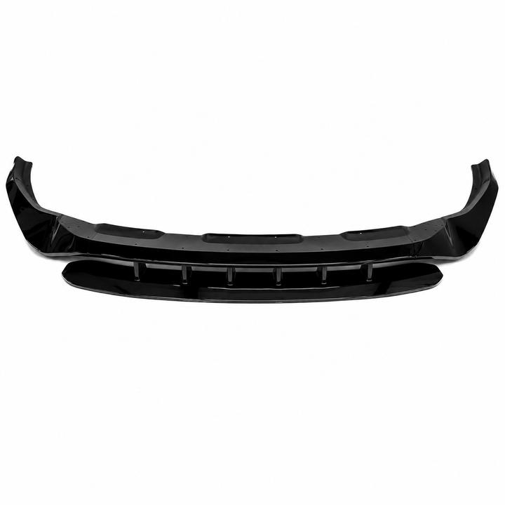 A black plastic car front splitter bumper lip trim piece, shown horizontally full built up kit against a plain white background.
