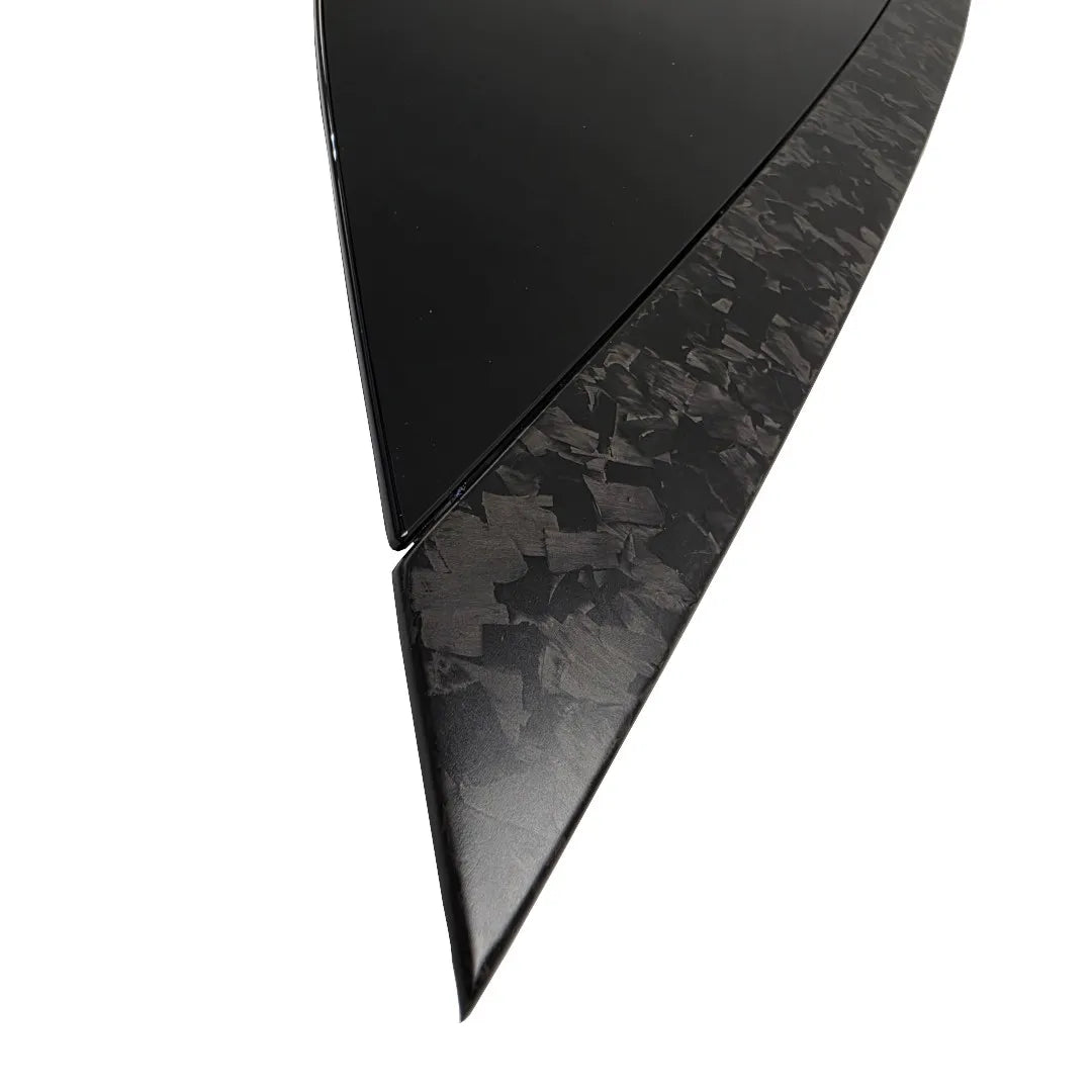 close up shot of Forged Carbon Fibre and Gloss Black Bonnet vent on a pure white background