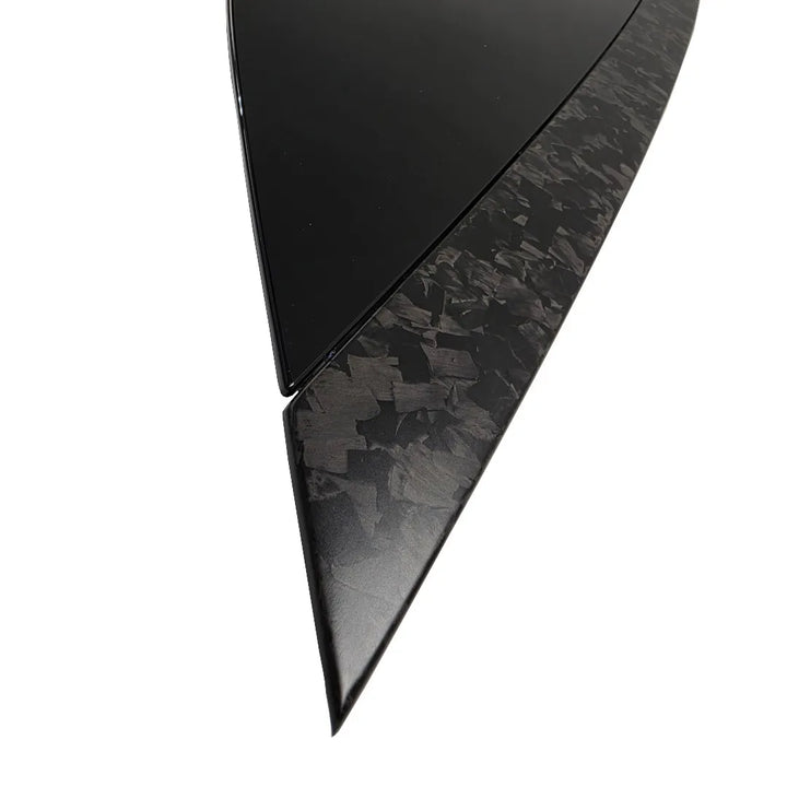 close up shot of Forged Carbon Fibre and Gloss Black Bonnet vent on a pure white background