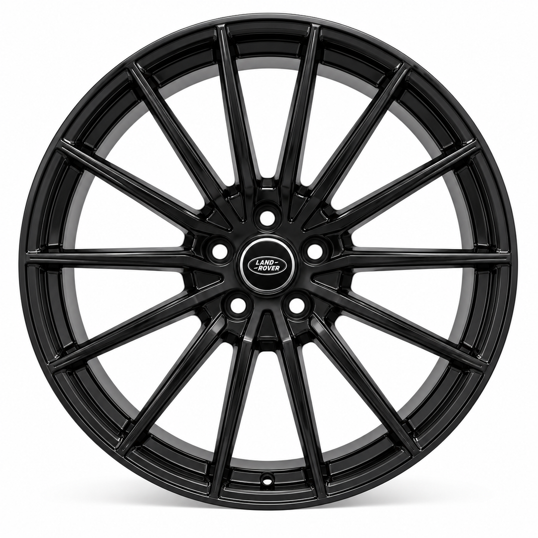 A single black multi-spoke alloy car wheel rim with a central Land Rover badge, shown on a clean white background.