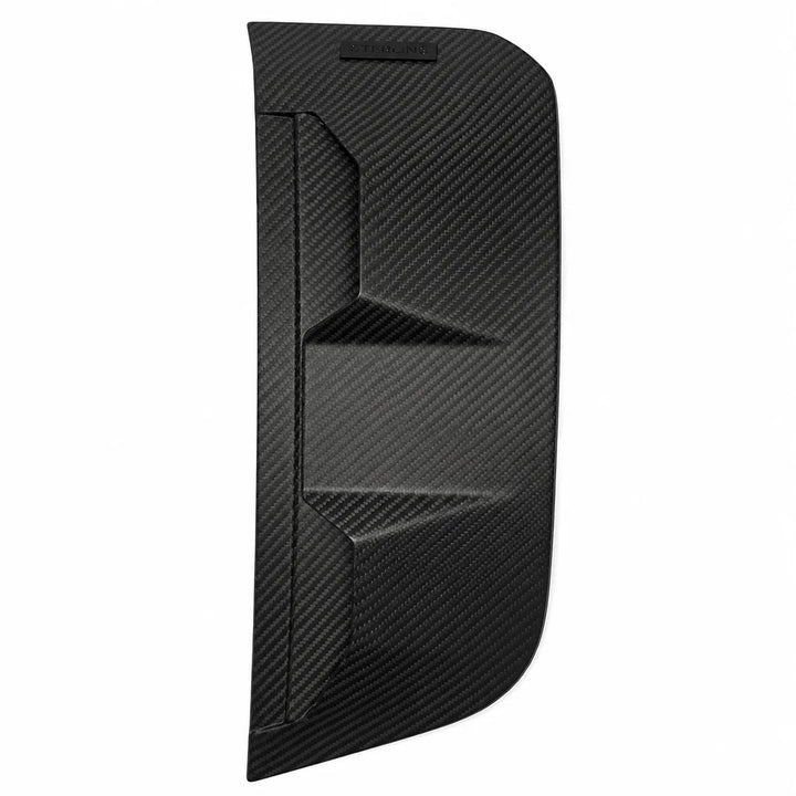 A black carbon fiber textured panel, likely an automotive side vent cover or trim piece, shown against a plain white background.