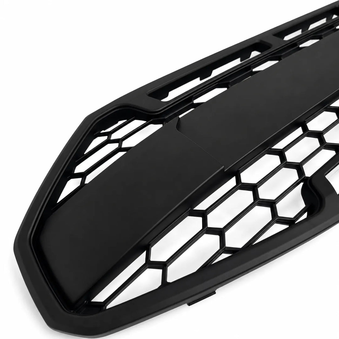 Black honeycomb car grille on a white background