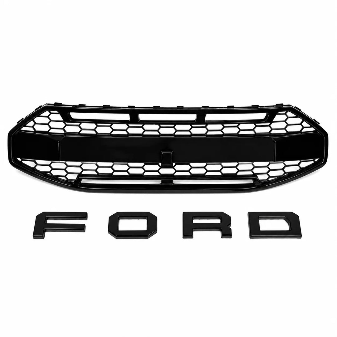 A black honeycomb front grille with four matching black 3D 'FORD' letter badges displayed below it on a plain white background.