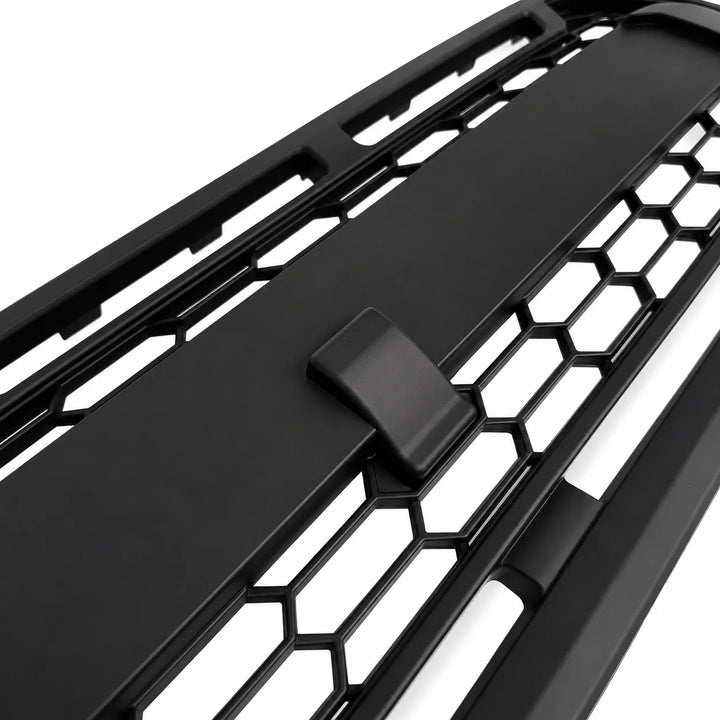 Black honeycomb car grille on a white background