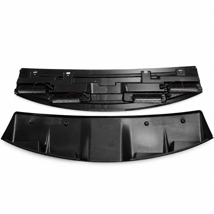 Two black plastic automotive roof body panels, front led roof light in 2 parts, displayed on a clean white background.