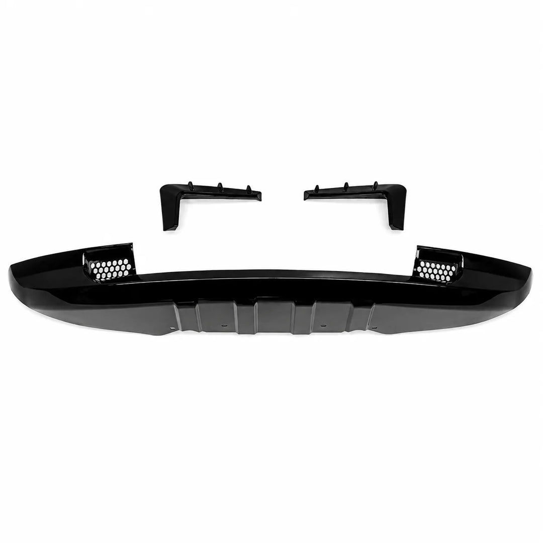 A glossy black plastic automotive bumper Khan style Look lip kit with two Fog Light Surrounds with 3 notches, displayed on a clean white background.