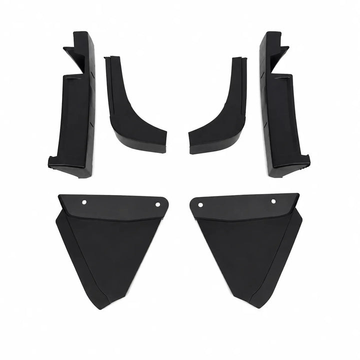 Four black plastic vehicle support brackets and matching arche supports arranged symmetrically on a plain white background.