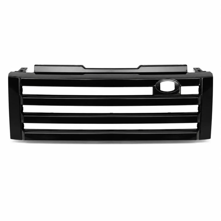 A black plastic vehicle front grille with horizontal slats and a circular emblem cutout, shown against a plain white background.
