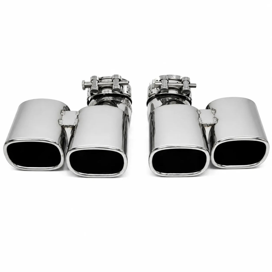 A set of four polished chrome exhaust tips arranged in two pairs of two, shown against a plain white background.