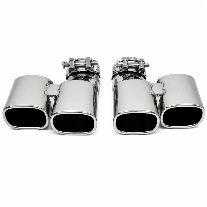 A set of four polished chrome exhaust tips arranged in two pairs of two, shown against a plain white background.