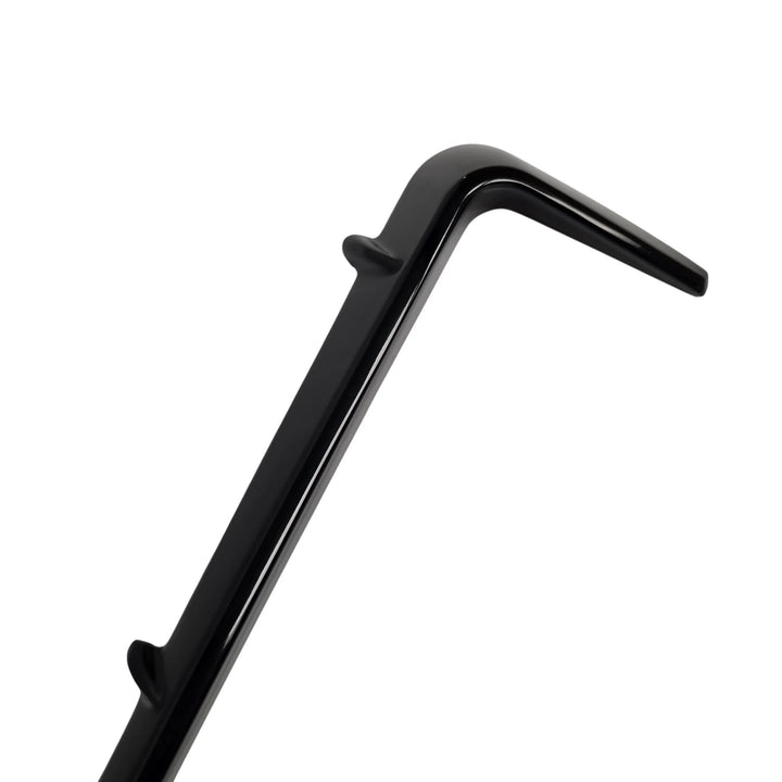 A close-up of a glossy black angular two notch front light fog surrounds winglets above on a white background., shown against a plain white background.

