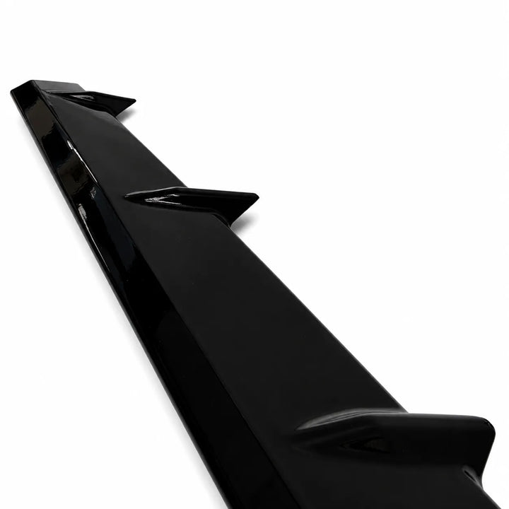 One Black Car Head Light Grilles Eyebrows Close Up on a white background