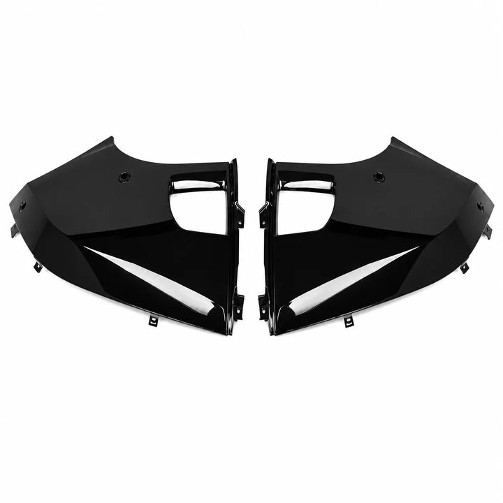 two glossy black Defender Bumper Trim corner panels arranged in a pair