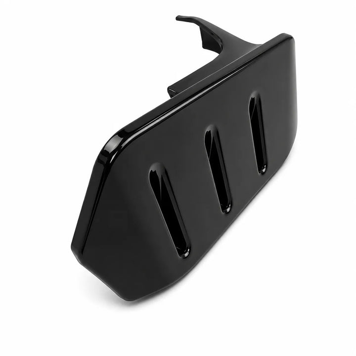 A glossy black plastic accessory with three vertical slots and a hook-like tab at the top, photographed on a clean white background.