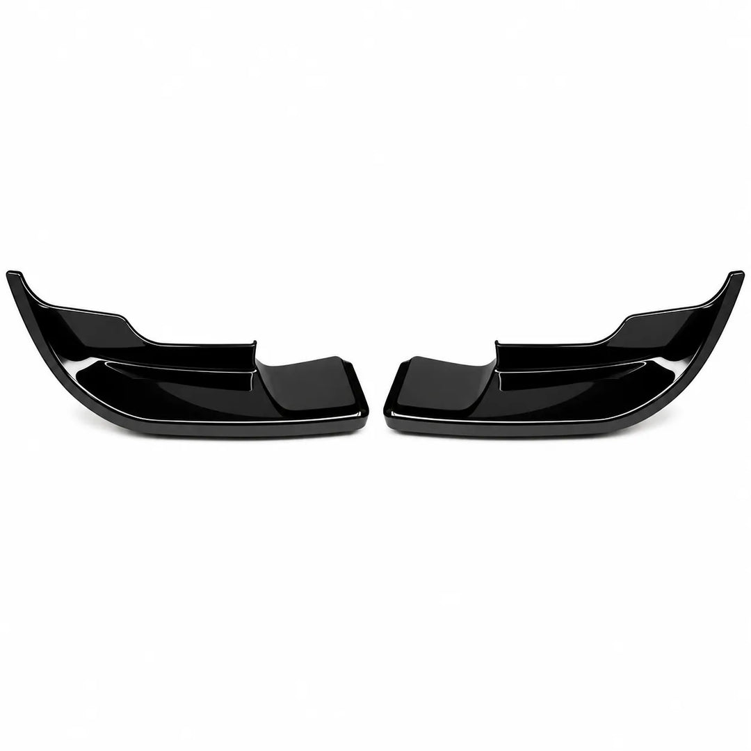 A glossy black plastic automotive trim piece, lower bumper lip fender extension, shown against a plain white background.