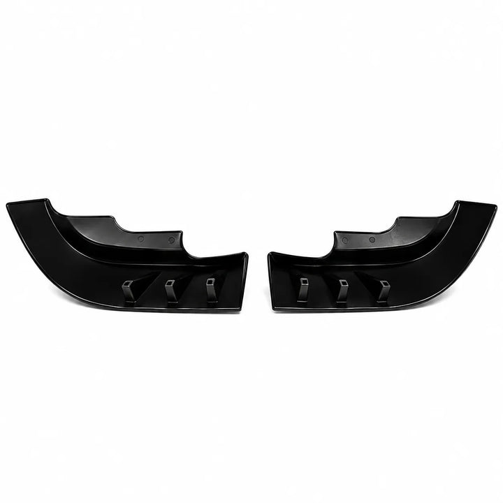 A reverse shot of a pair of glossy black plastic low lip lower bumper trim piece fender extension, no parking sensors shown against a plain white background.