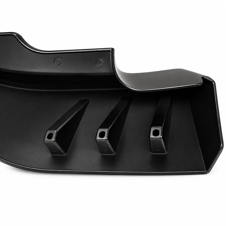 Black lower bumper trim molded plastic automotive trim or panel piece shown on a plain white background, with a second matching piece partially visible at the bottom left.