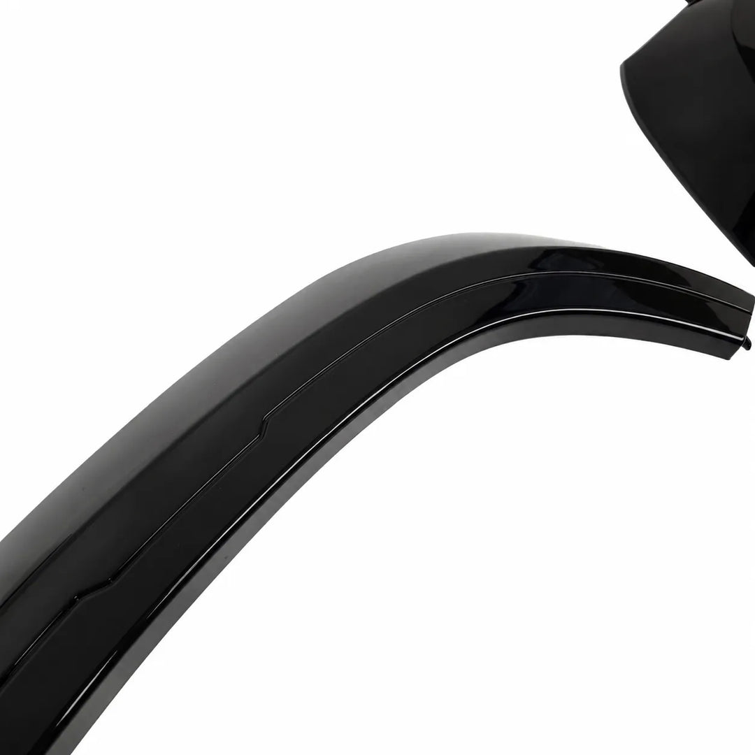 A glossy black curved automotive body trim piece or fender section shown on a plain white background.
