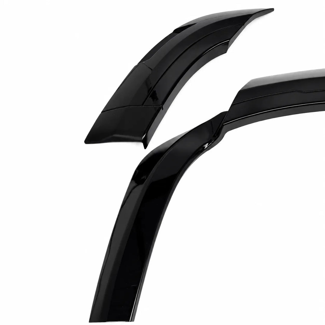 Two glossy black car SUV wheel arch wing accessories shown on a plain white background.