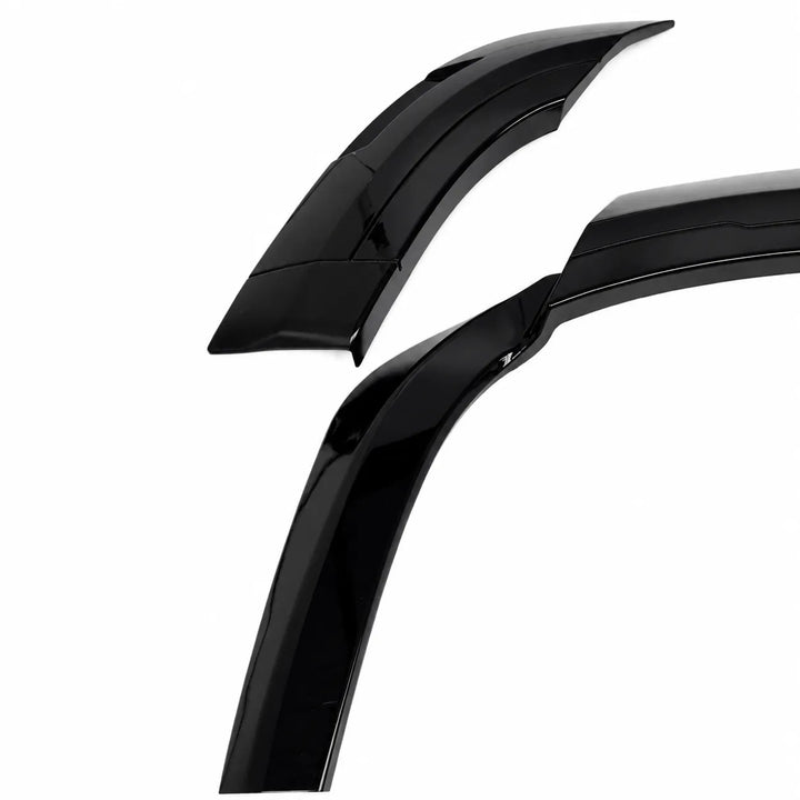 Two glossy black car SUV wheel arch wing accessories shown on a plain white background.
