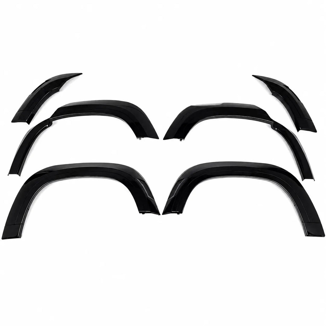 Four black glossy car wheel arches or fender extensions arranged symmetrically on a plain white background. 6x Gloss Black Raptor Style Arches full 6 piece set