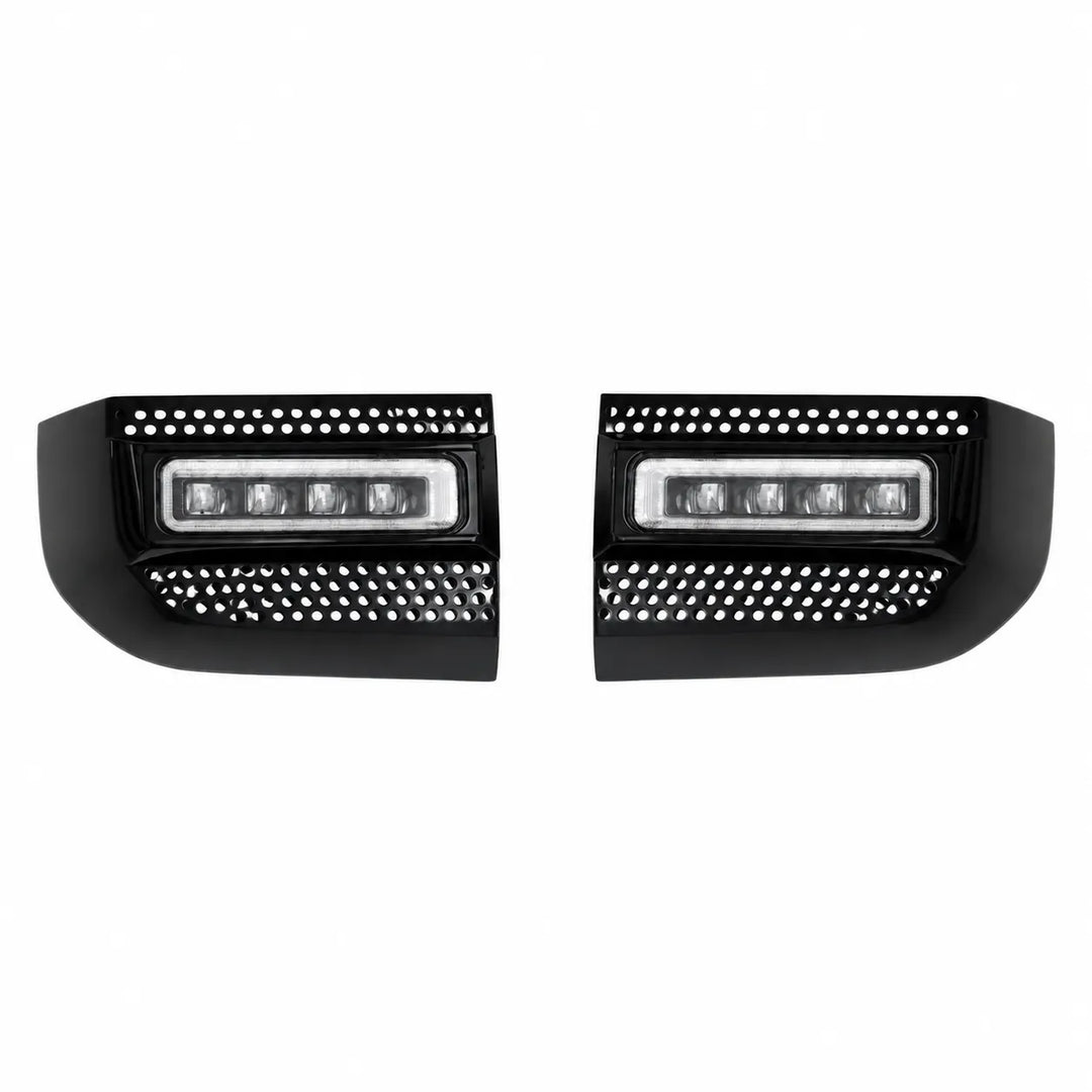 A pair of black rectangular LED light bars with perforated grilles on a plain white background.
