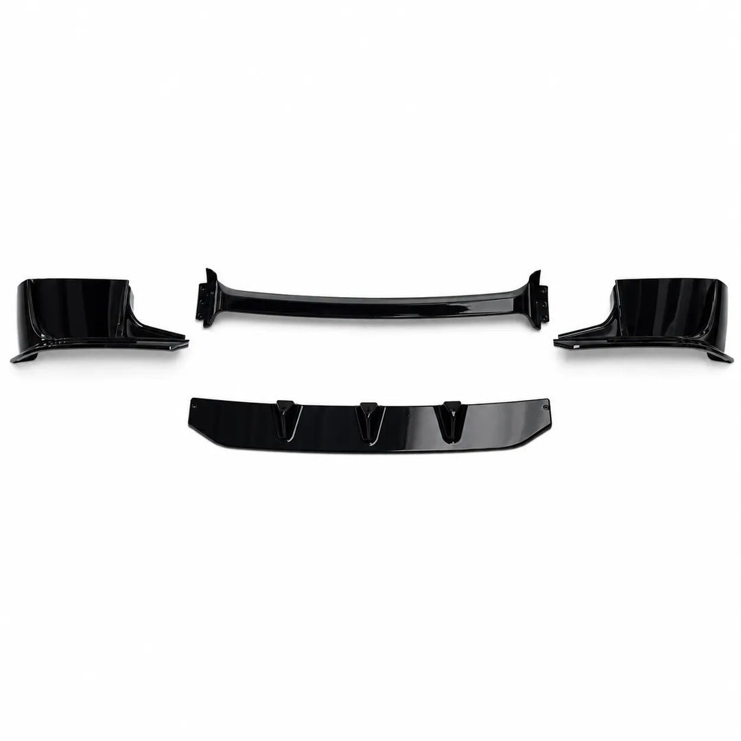automotive body trim pieces finished glossy black, A complete kit of a front bumper splitter extension displayed on a clean white background.