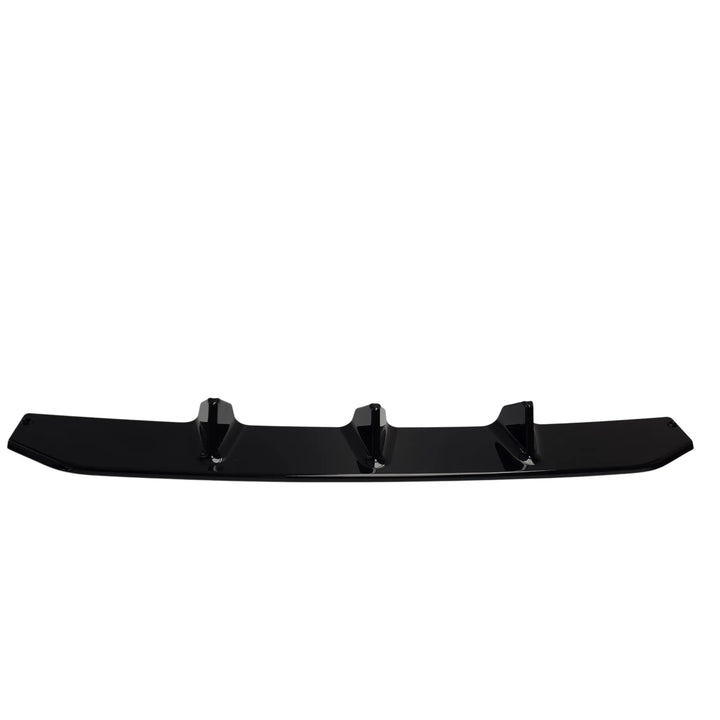 A glossy black automotive part of a front splitter lip with three mounting points, shown against a plain white background.