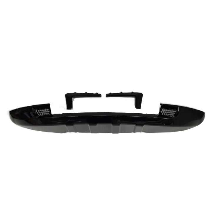 A glossy black plastic automotive bumper Khan style Look lip kit with two Fog Light Surrounds with 3 notches, displayed on a clean white background.