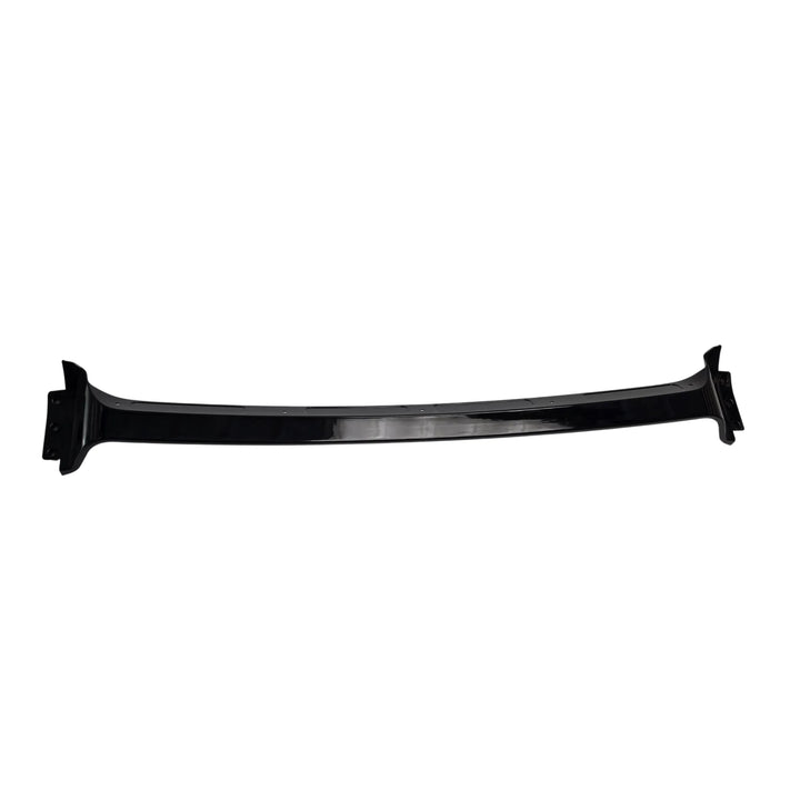 part of a glossy black lower automotive body splitter piece, part of a front bumper splitter extension shown at an angle on a plain white background.