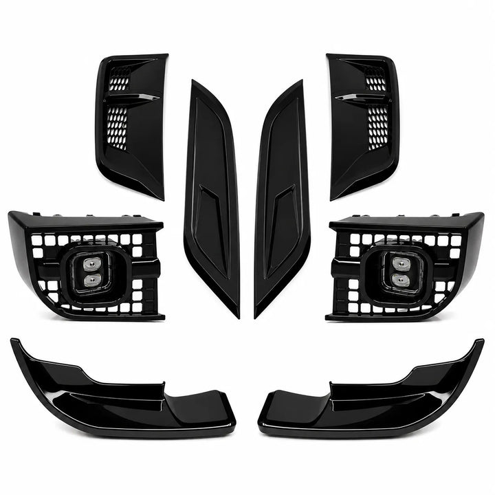 A set of glossy black car exterior trim pieces, including two large lower lip spoilers, two tall center bonnet smooith trim pieces, and two side grille inserts, arranged on a plain white background.
