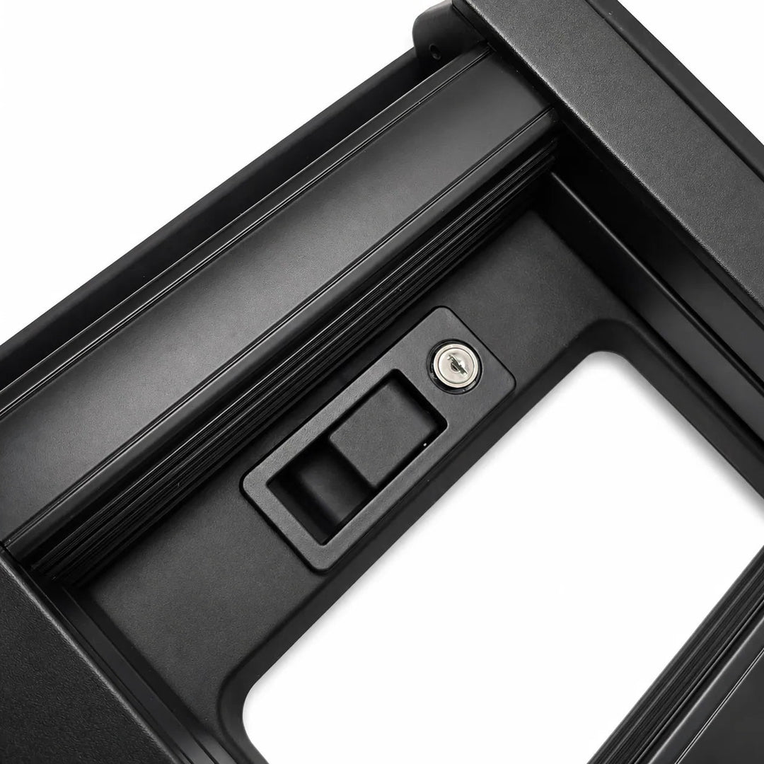 Close-up of a black metal foot rung ladder section with a latch mechanism and a small keyhole detail, shown on a white background.