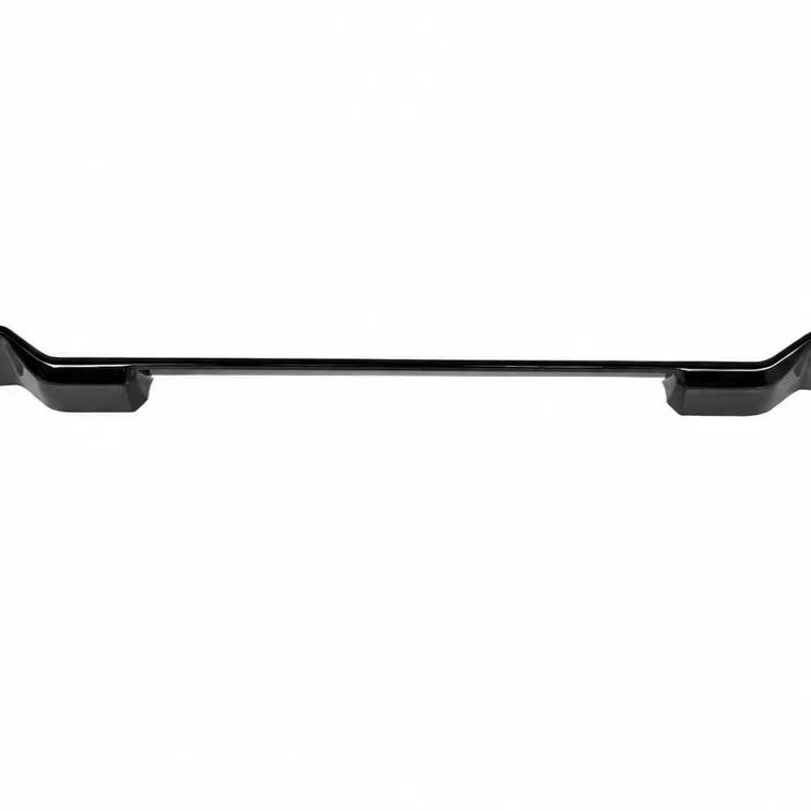 A glossy black automotive spoiler or lip trim piece shown horizontally on a plain white background.