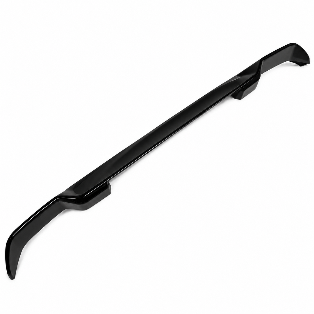 A glossy black automotive trunk spoiler lip shown diagonally on a plain white background.