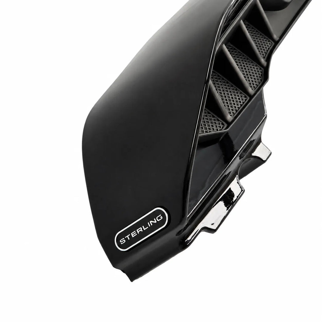 A close-up of a glossy black Defender Spoiler side panel with a visible Sterling logo badge, shown on a plain white background.