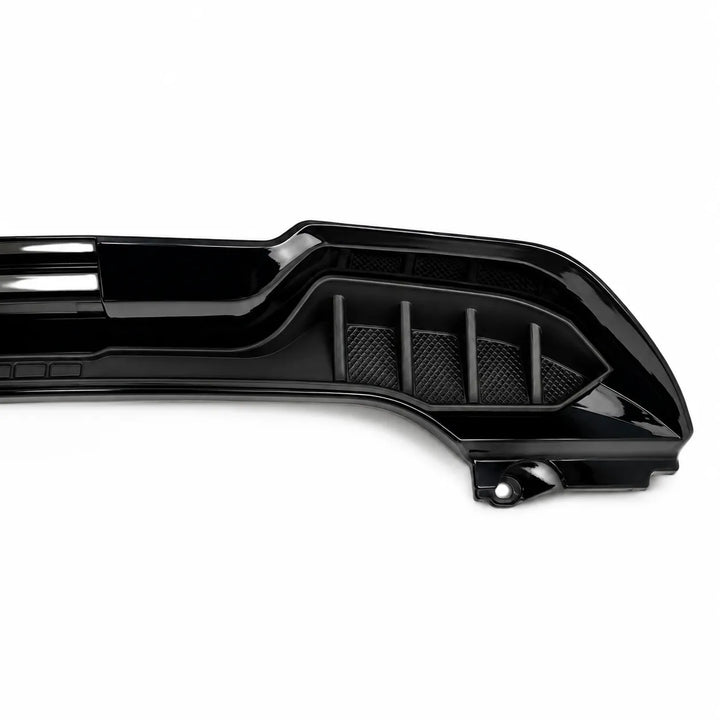 A glossy black automotive grille trim piece with integrated mesh vents, shown on a clean white background.