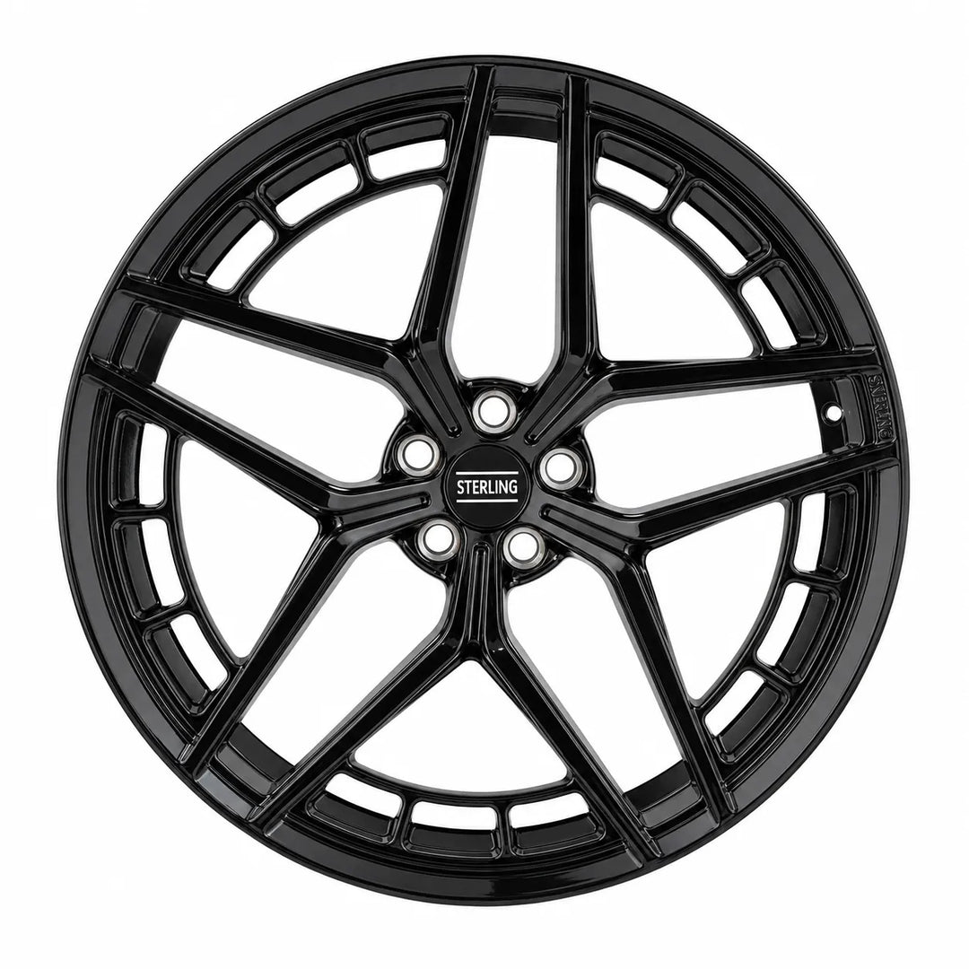 A single black multi-spoke alloy car wheel rim shown from a top-down angle on a plain white background. The center cap and edge of the wheel features the 'STERLING' brand name.