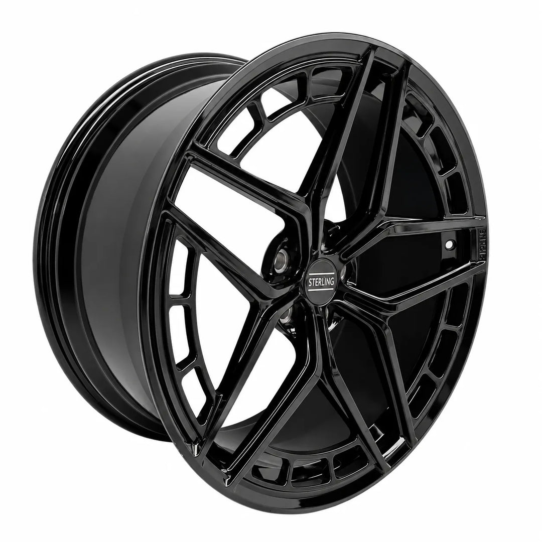 A glossy black multi-spoke alloy wheel rim shown at a three-quarter angle on a plain white background.