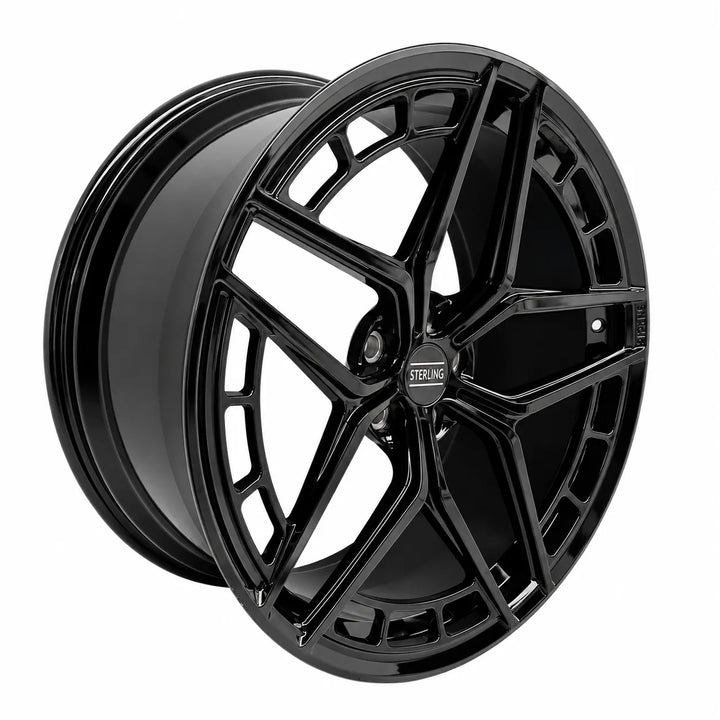 A glossy black multi-spoke alloy wheel rim shown at a three-quarter angle on a plain white background.