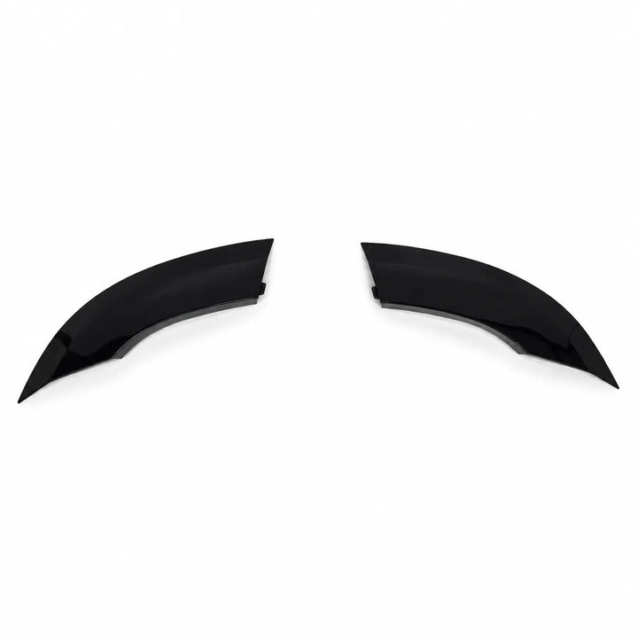 Two plastic Sterling automotive wheel arches fender covers on a plain white background, 2 piece arch gloss black abs.