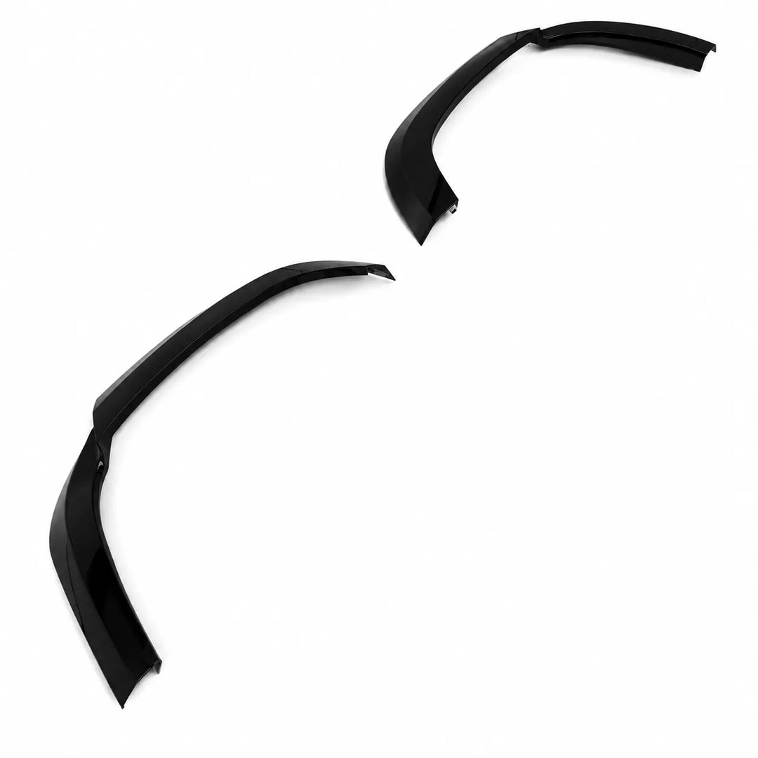 Two plastic Sterling automotive wheel arches fender covers on a plain white background, 3 piece arch set gloss black abs.