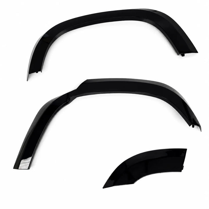 Two plastic Sterling automotive wheel arches fender covers arranged in a LHS layout on a plain white background, 3 piece arch set gloss black abs.