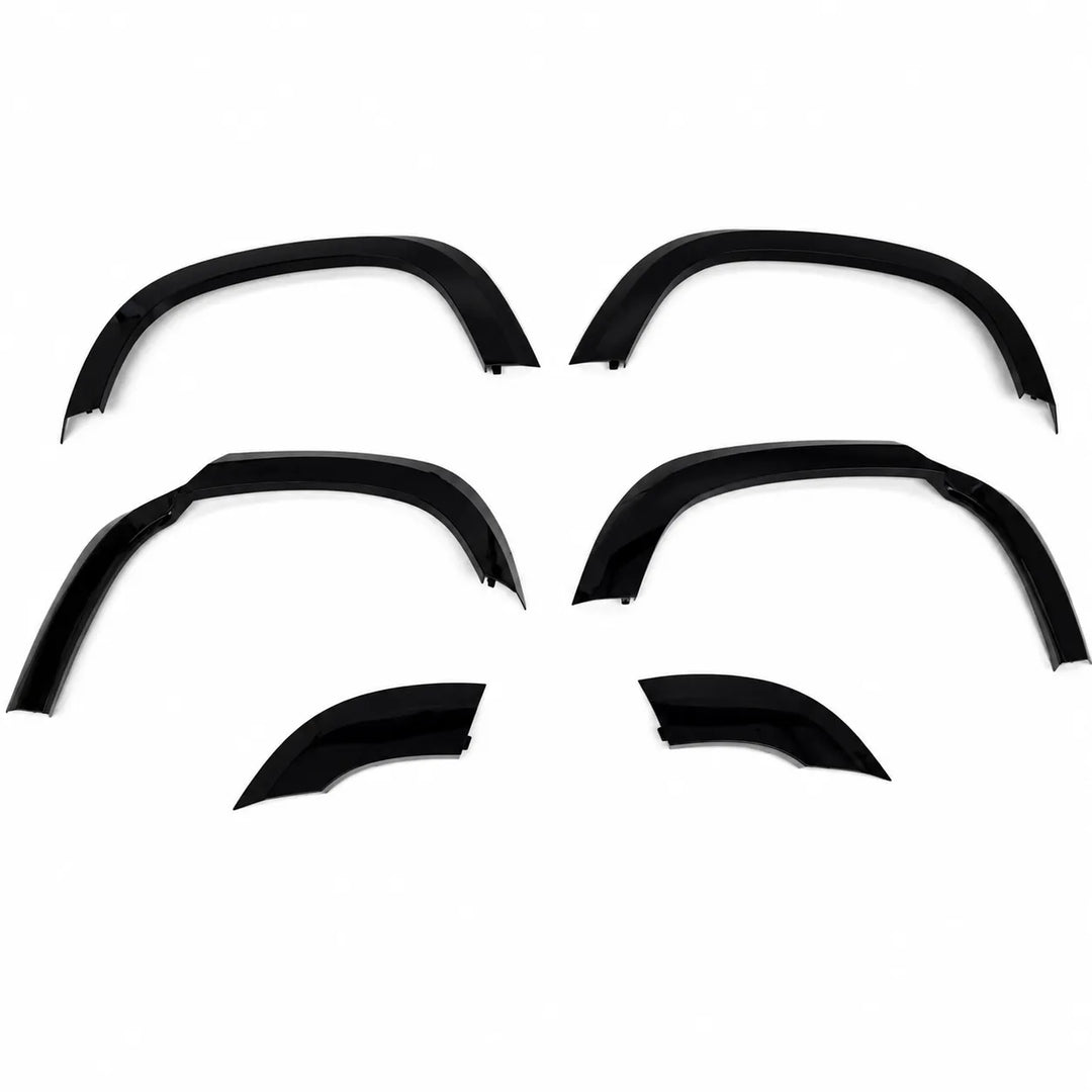Four plastic Sterling automotive wheel arches fender covers arranged in a 2x2 layout on a plain white background, 6 piece arch set gloss black abs.